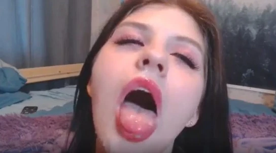 Cum in the mouth of a beauty webcam