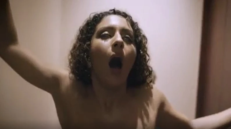 Surrendered to the waiter in the toilet while her husband is waiting for her