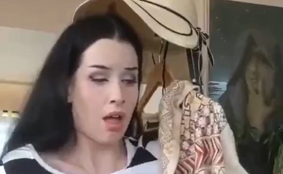 The beauty caresses and appeals herself