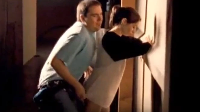 Naked Christine Milioti bent down in front of a friend